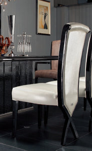 Two 43.5" White Leatherette and Black Wood Dining Chairs with X Shaped Rear Legs