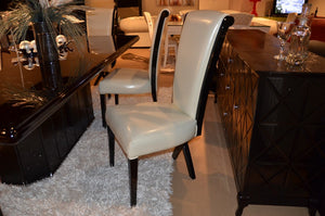 Two 43.5" White Leatherette and Black Wood Dining Chairs with X Shaped Rear Legs