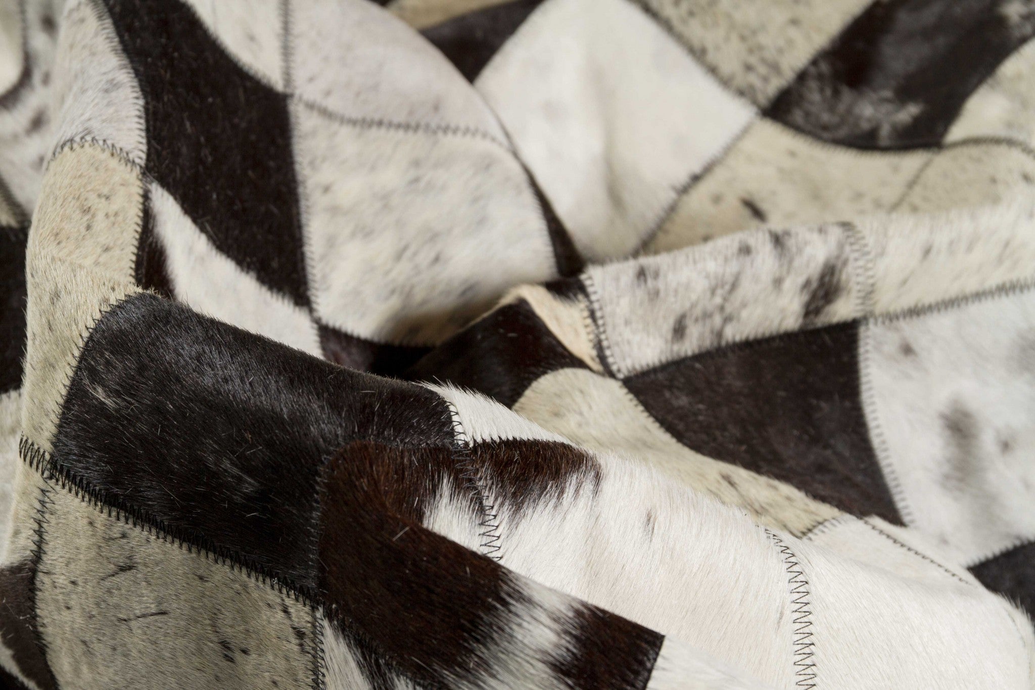 60" x 96" Black and White, 4" Square Patches, Cowhide - Area Rug