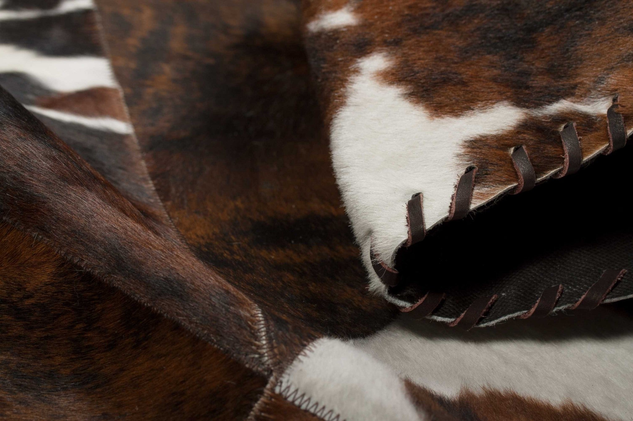 2" x 6" Chocolate And Natural Runner Stitch Cowhide - Area Rug