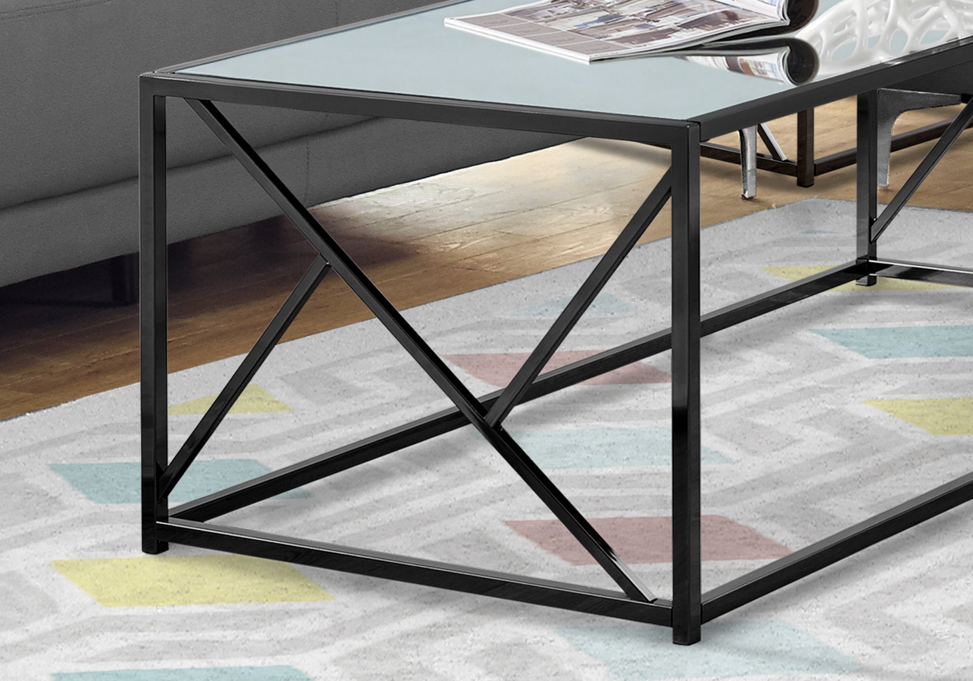 23.75" x 47.25" x 17.5" Black Metal Glass Particle Board  Coffee Table with a Mirror Top