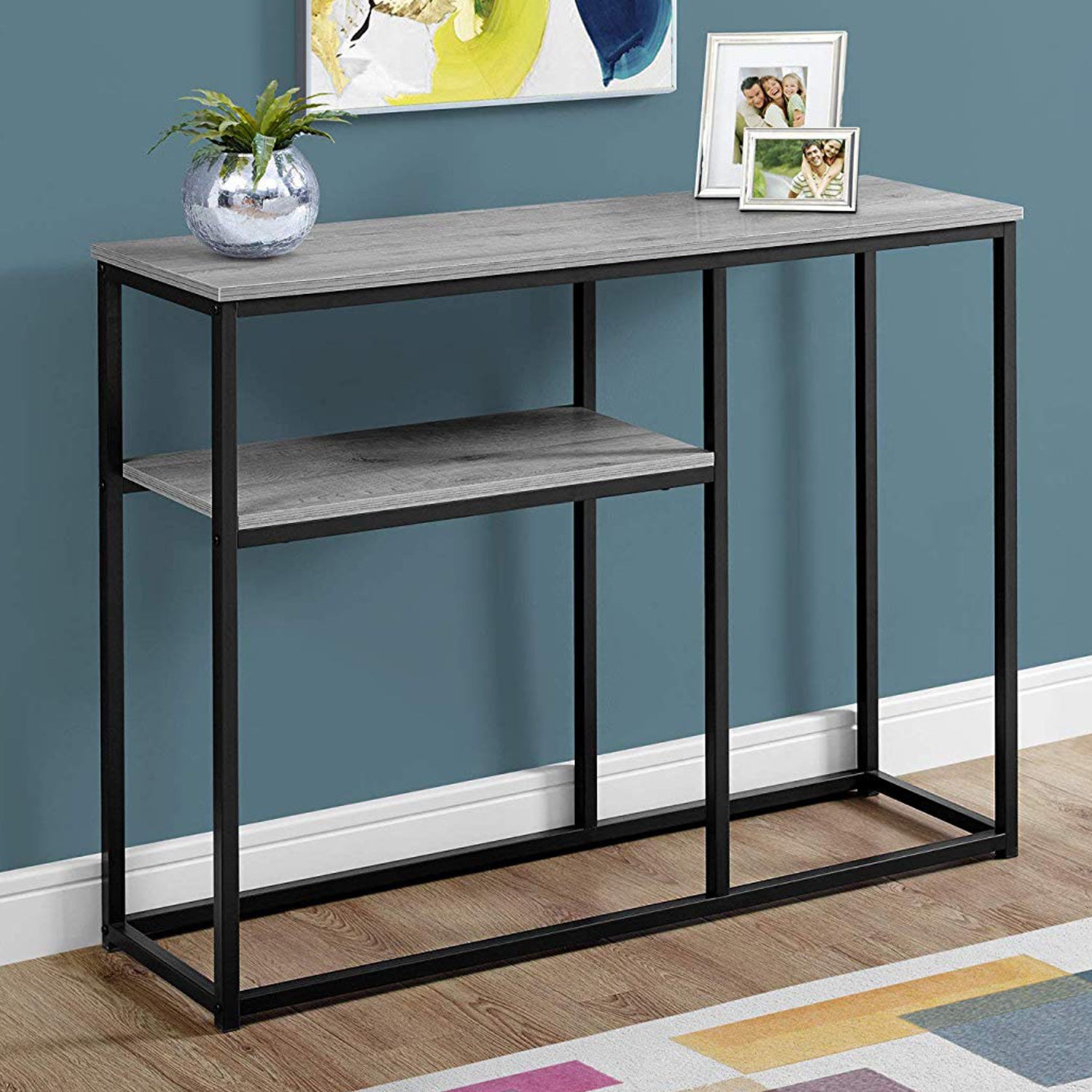 12" x 42" x 32" Black Metal Accent Table