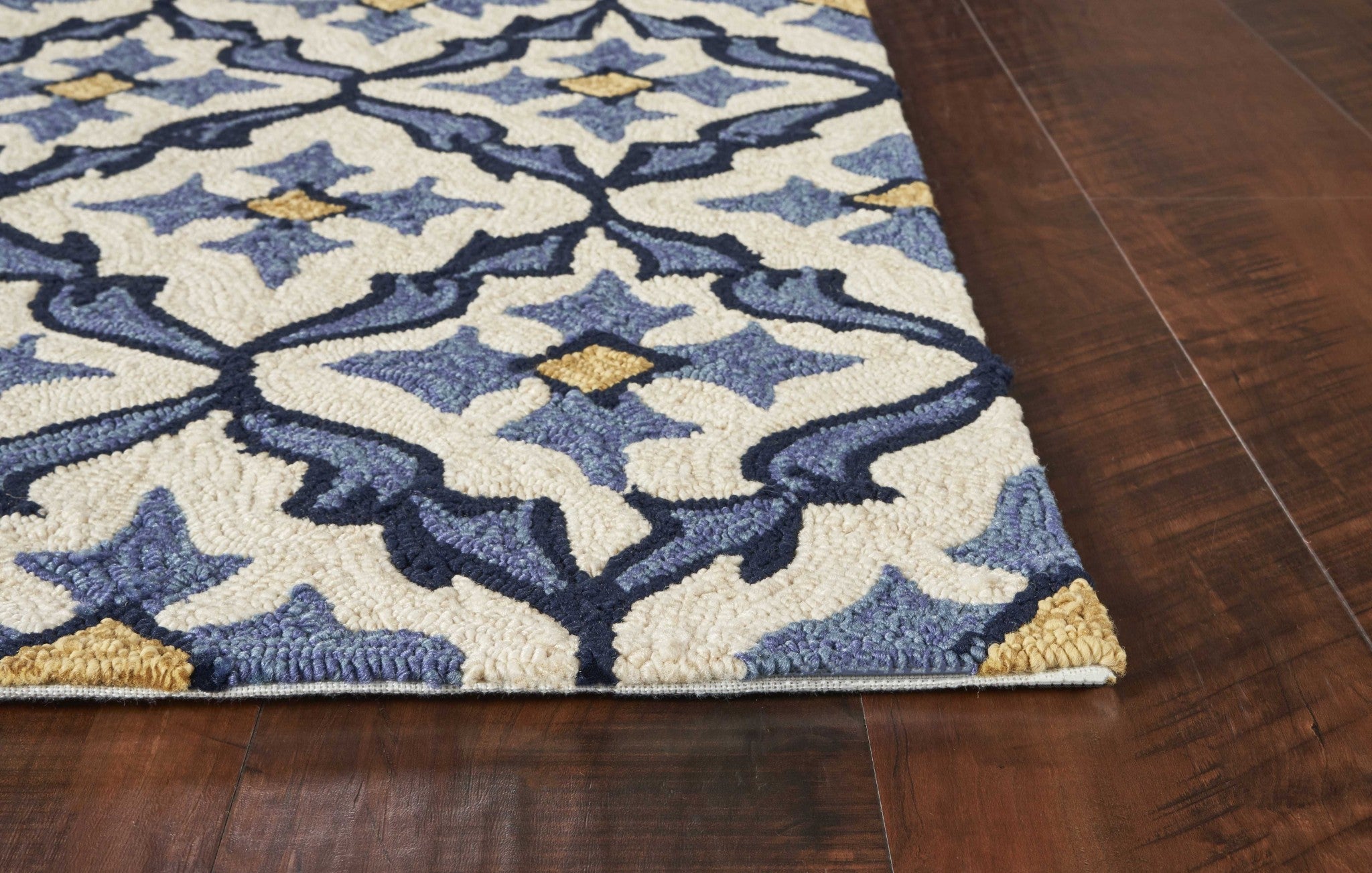 7' x 9'  UV treated Polypropylene Ivory or Blue Area Rug