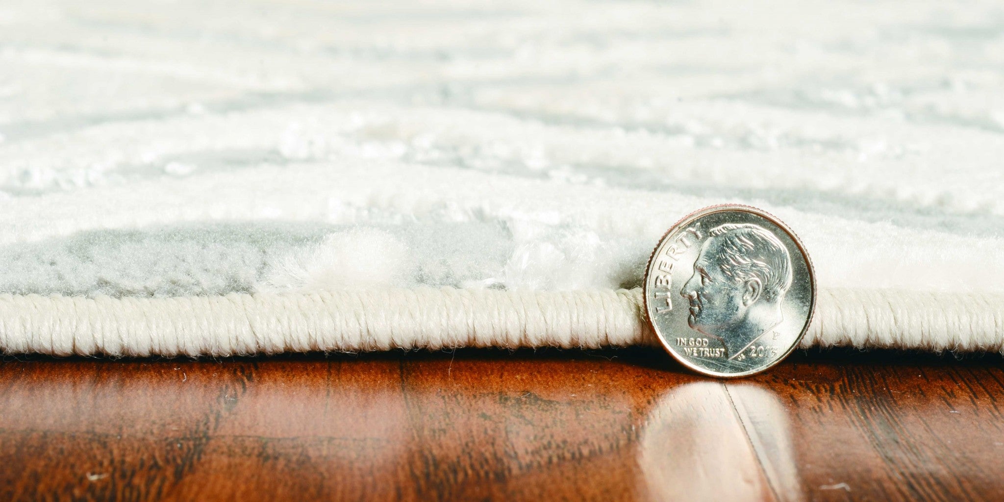 7' x 10'  Polyester Sand Silver Area Rug