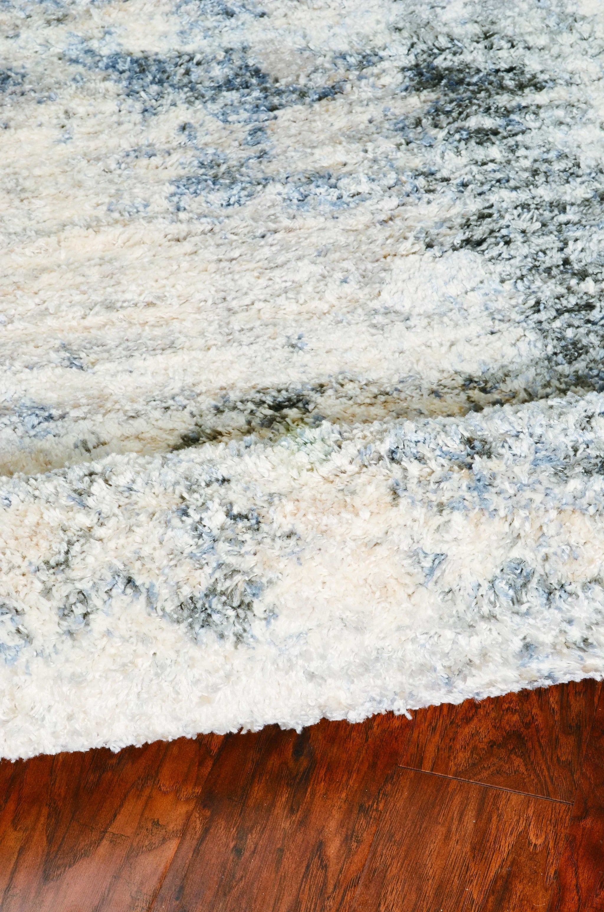 5' x 7' Polypropylene Ivory or Blue Area Rug