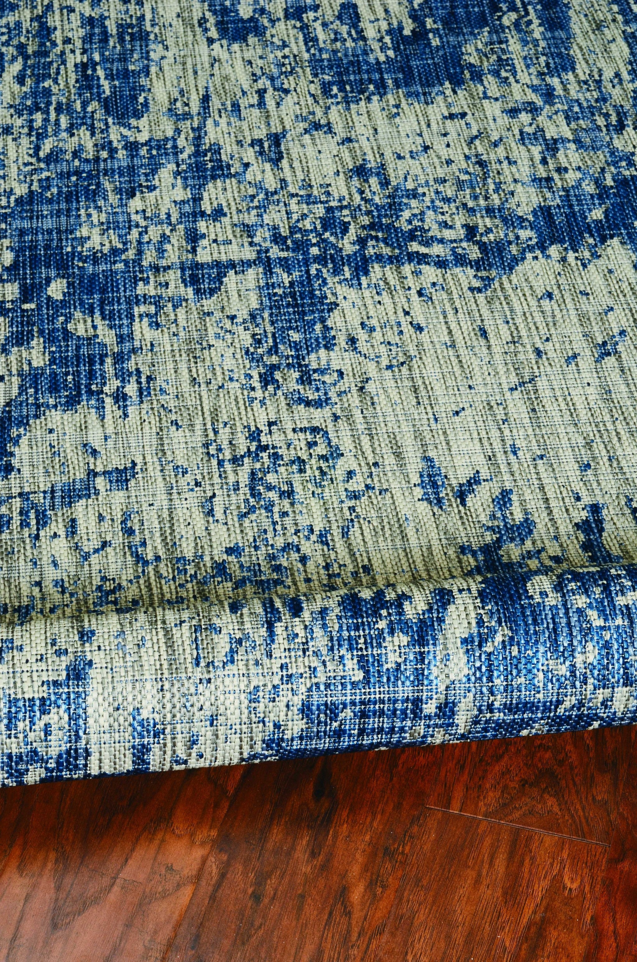 5 x 7  UV treated Polypropylene Grey or  Denim Area Rug