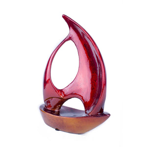 Stunning Red and Orange Ceramic Sailboat Sculpture