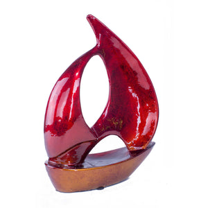 Stunning Red and Orange Ceramic Sailboat Sculpture
