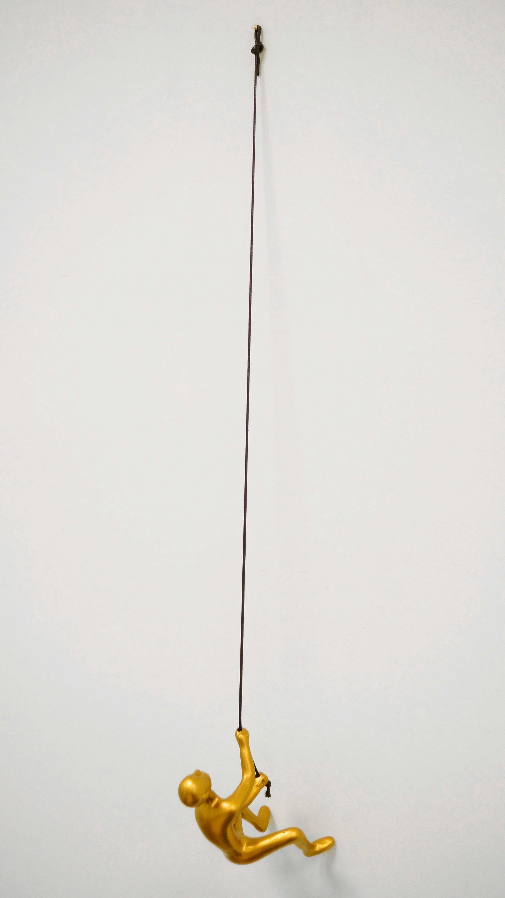 6" x 3" x 3" Resin Gold Climbing Man