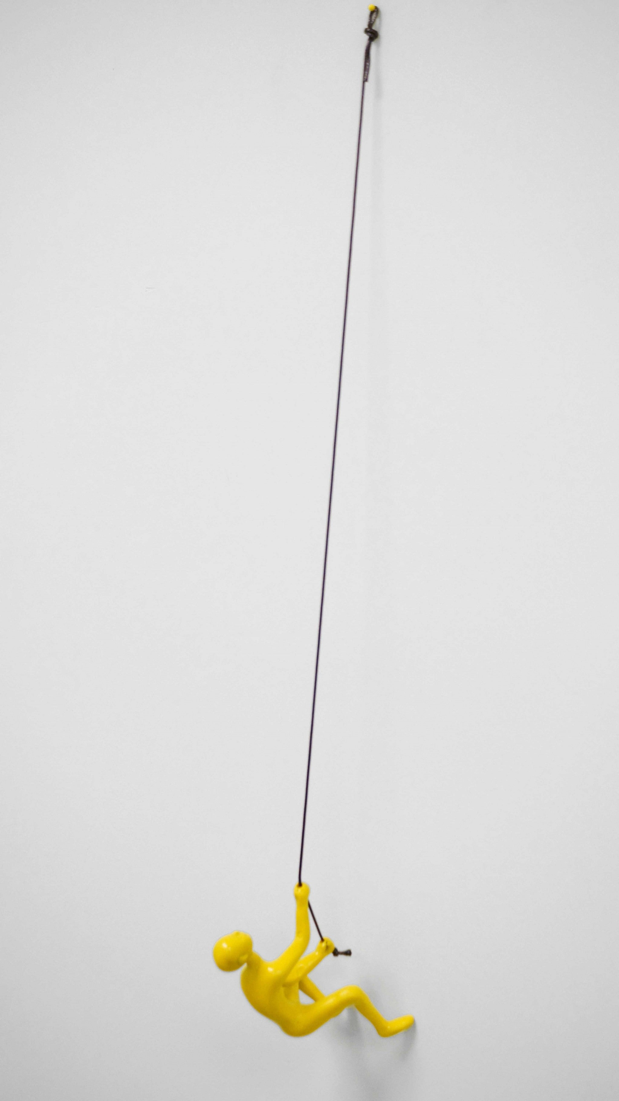 6" x 3" x 3" Resin Yellow Climbing Man