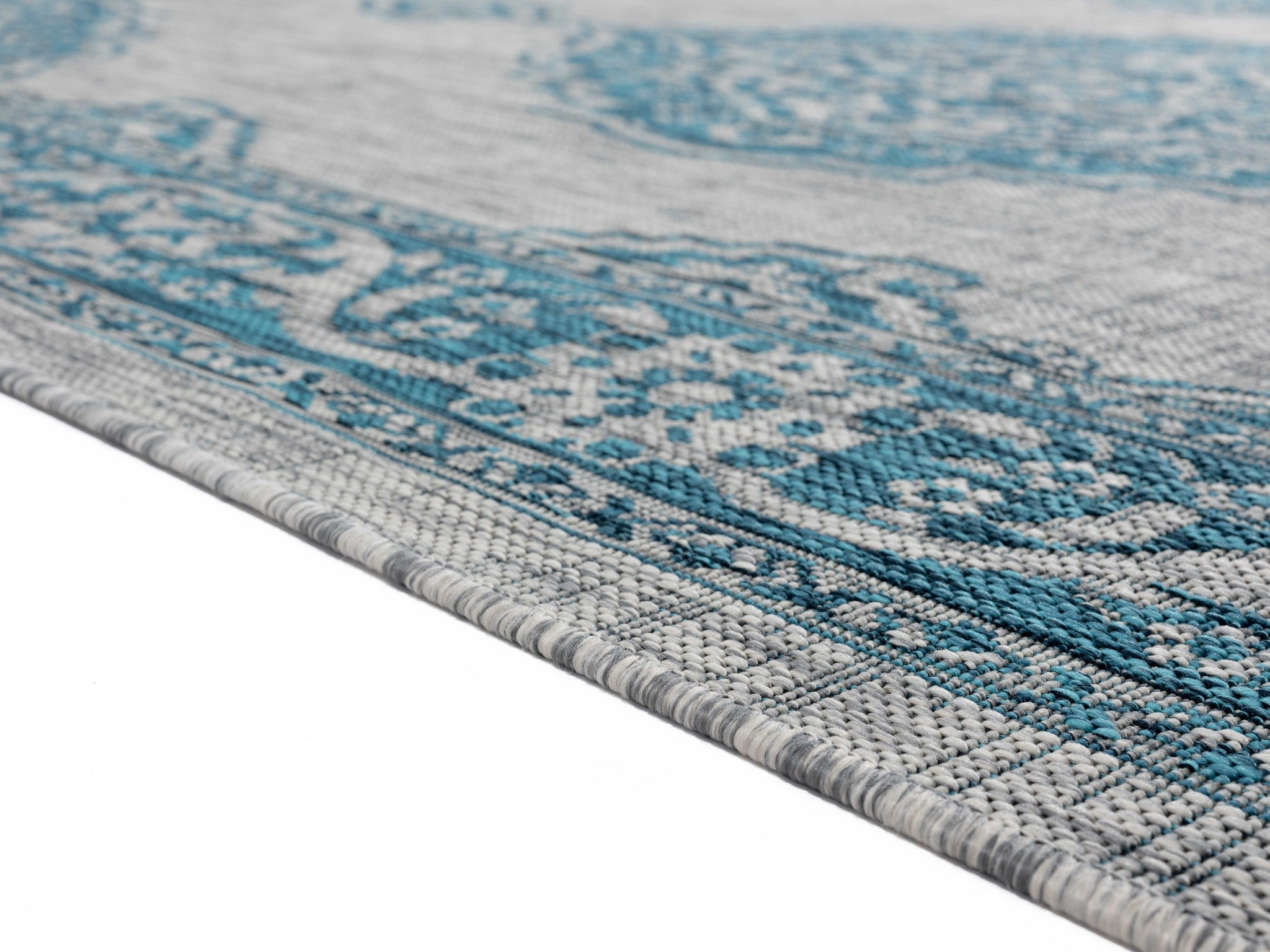 63" x 90" Aqua Polypropylene Area Rug