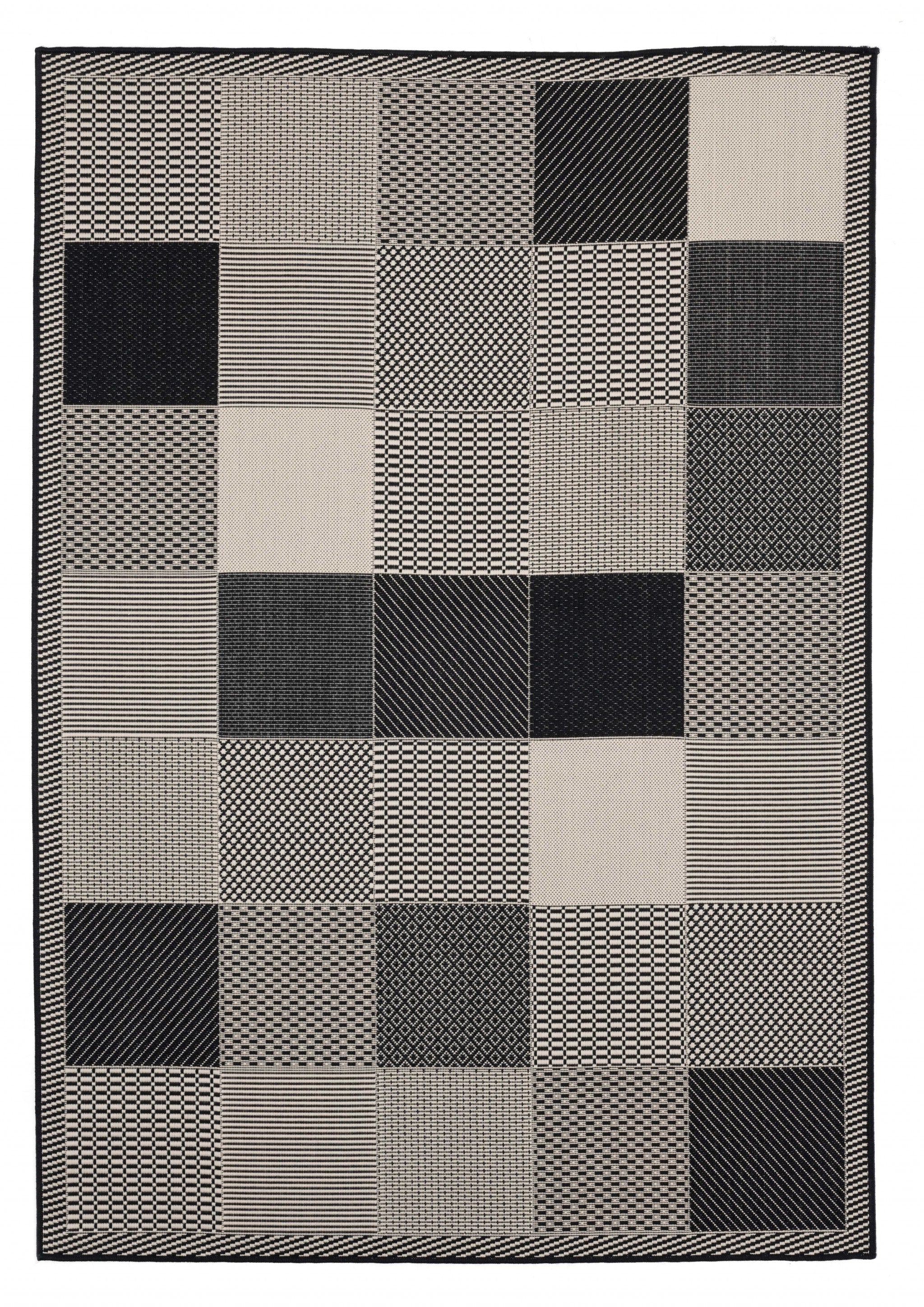 63" x 90" Black Polypropylene Area Rug