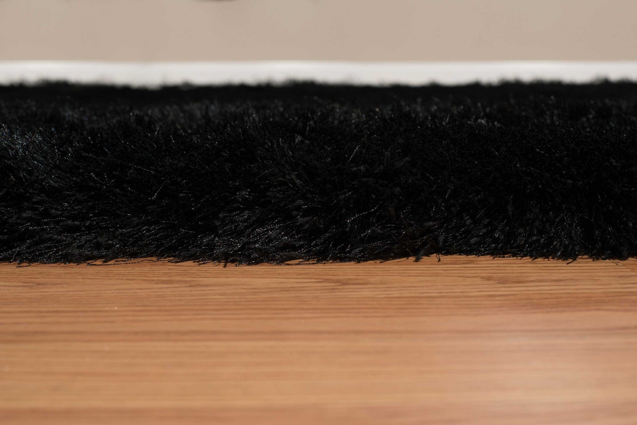 63" x 86" Black Polyester Area Rug