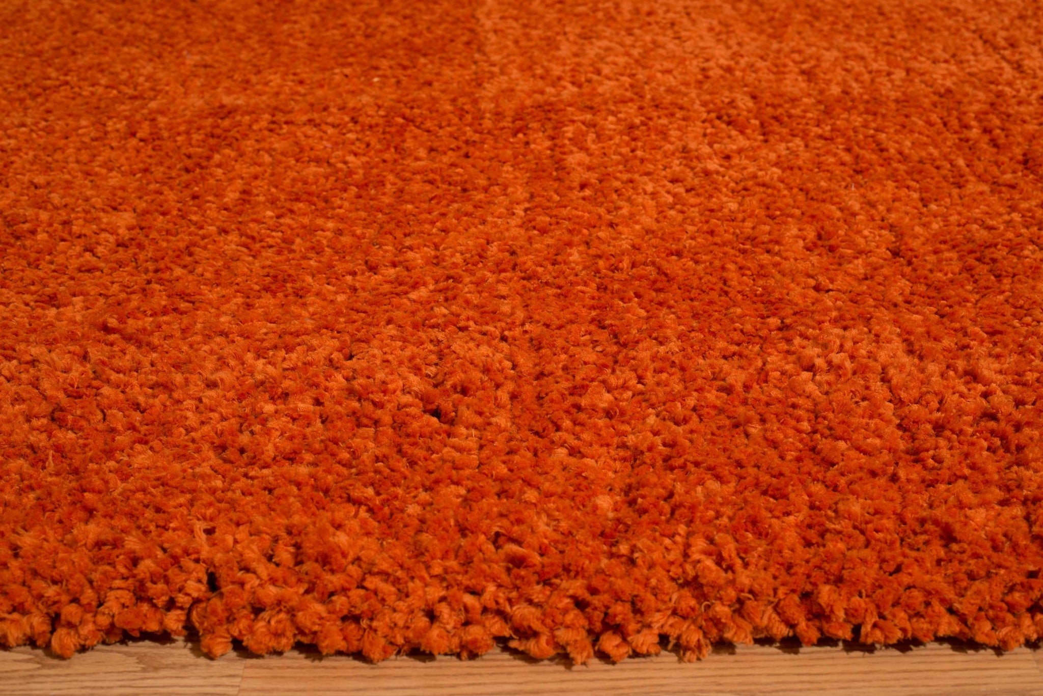 63" x 86" Orange Polyester Area Rug