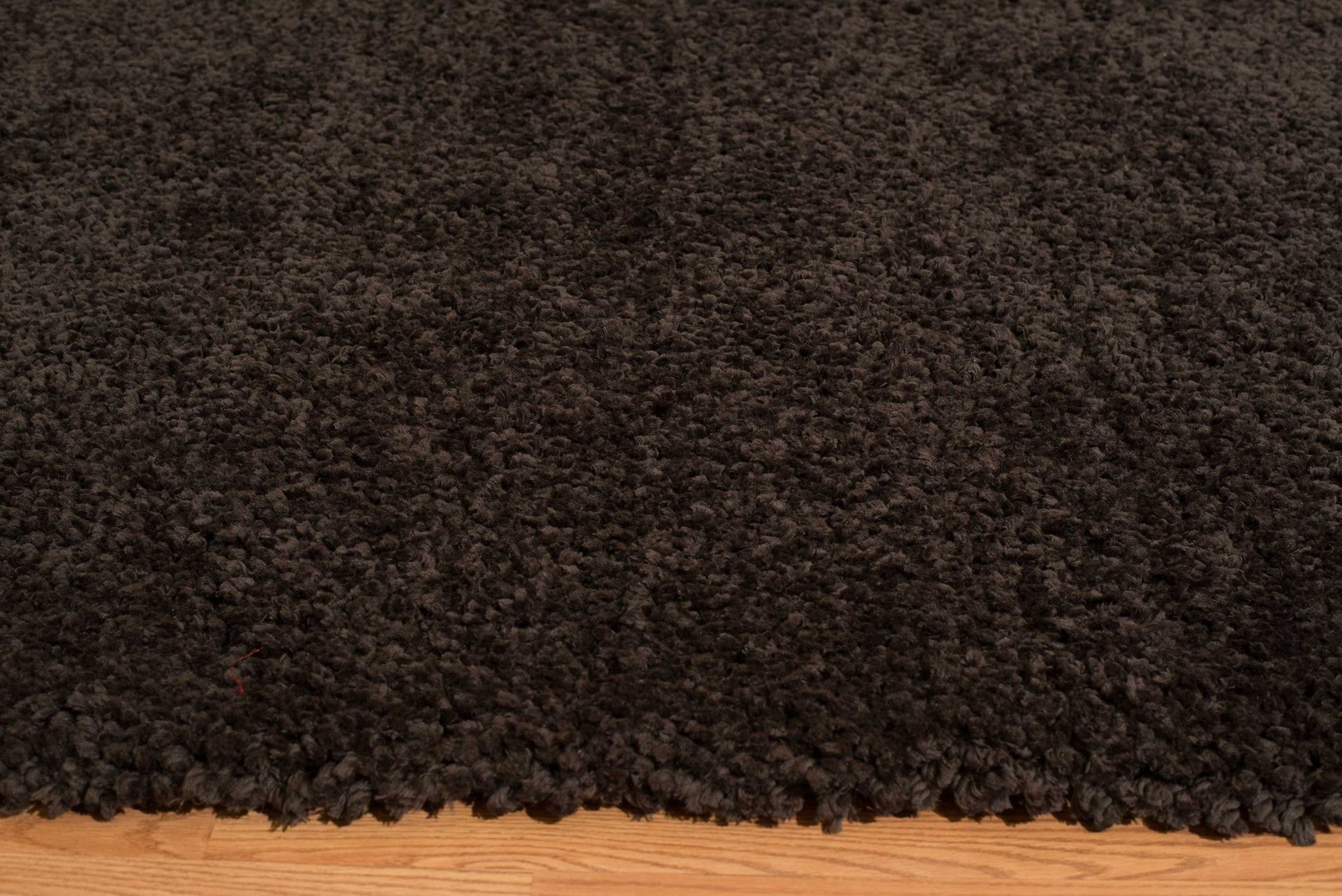 63" x 86" Dark Chocolate Polyester Area Rug
