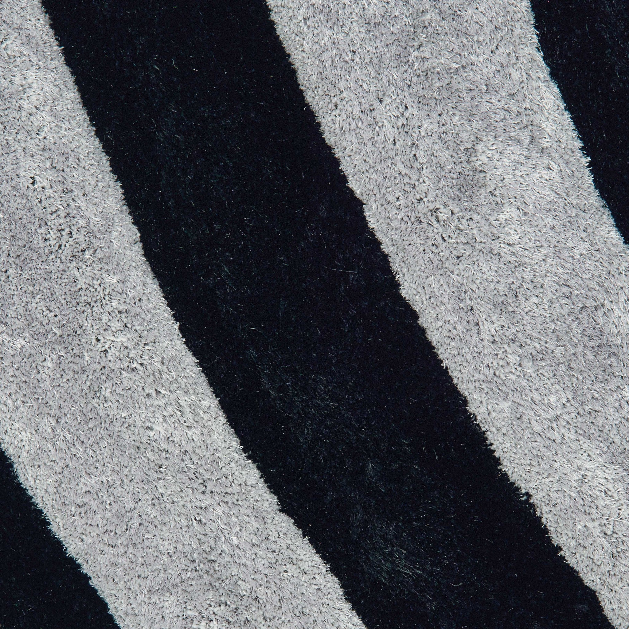 63" x 86" Grey Polyester Area Rug