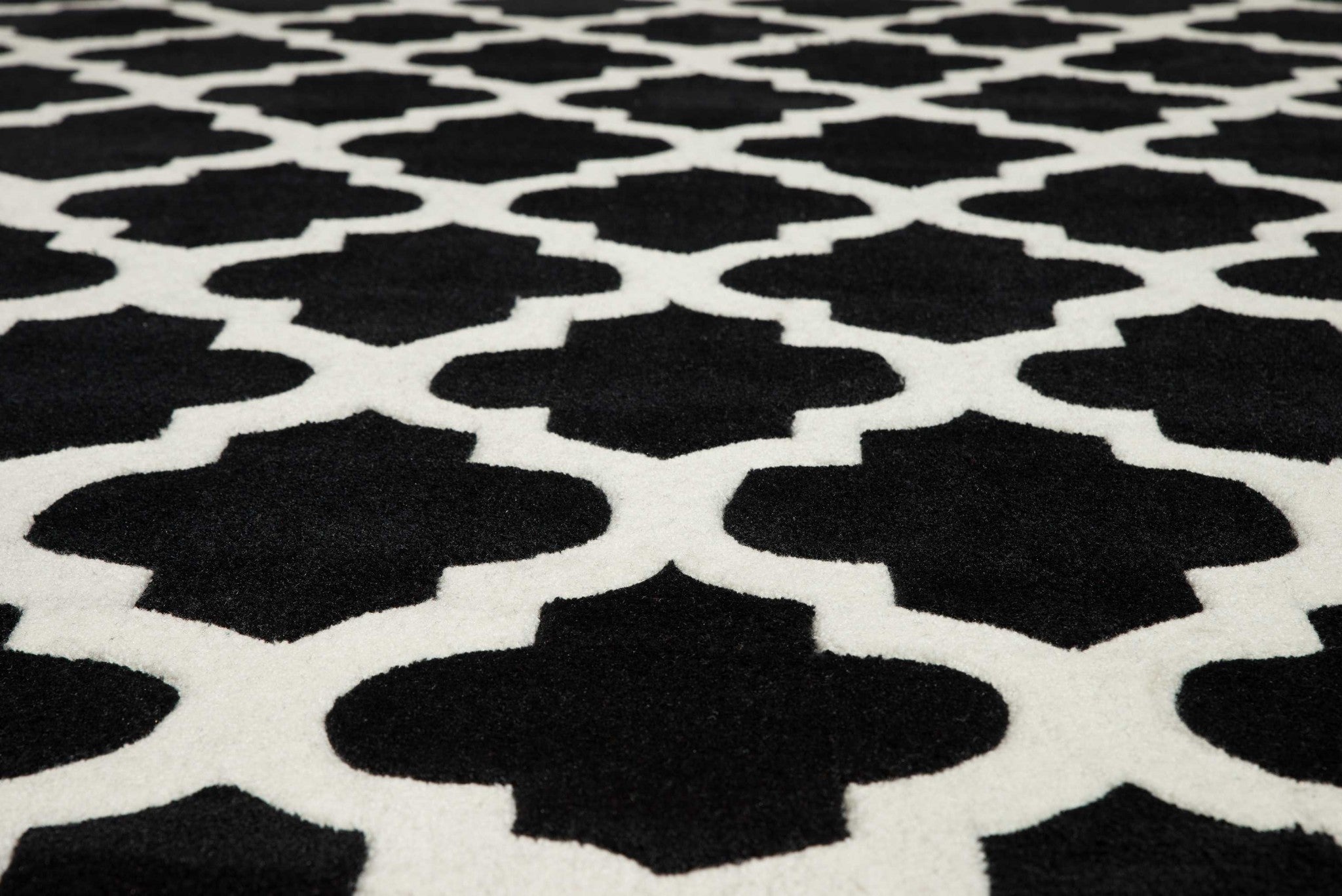 63" x 86" Black Polyester Area Rug