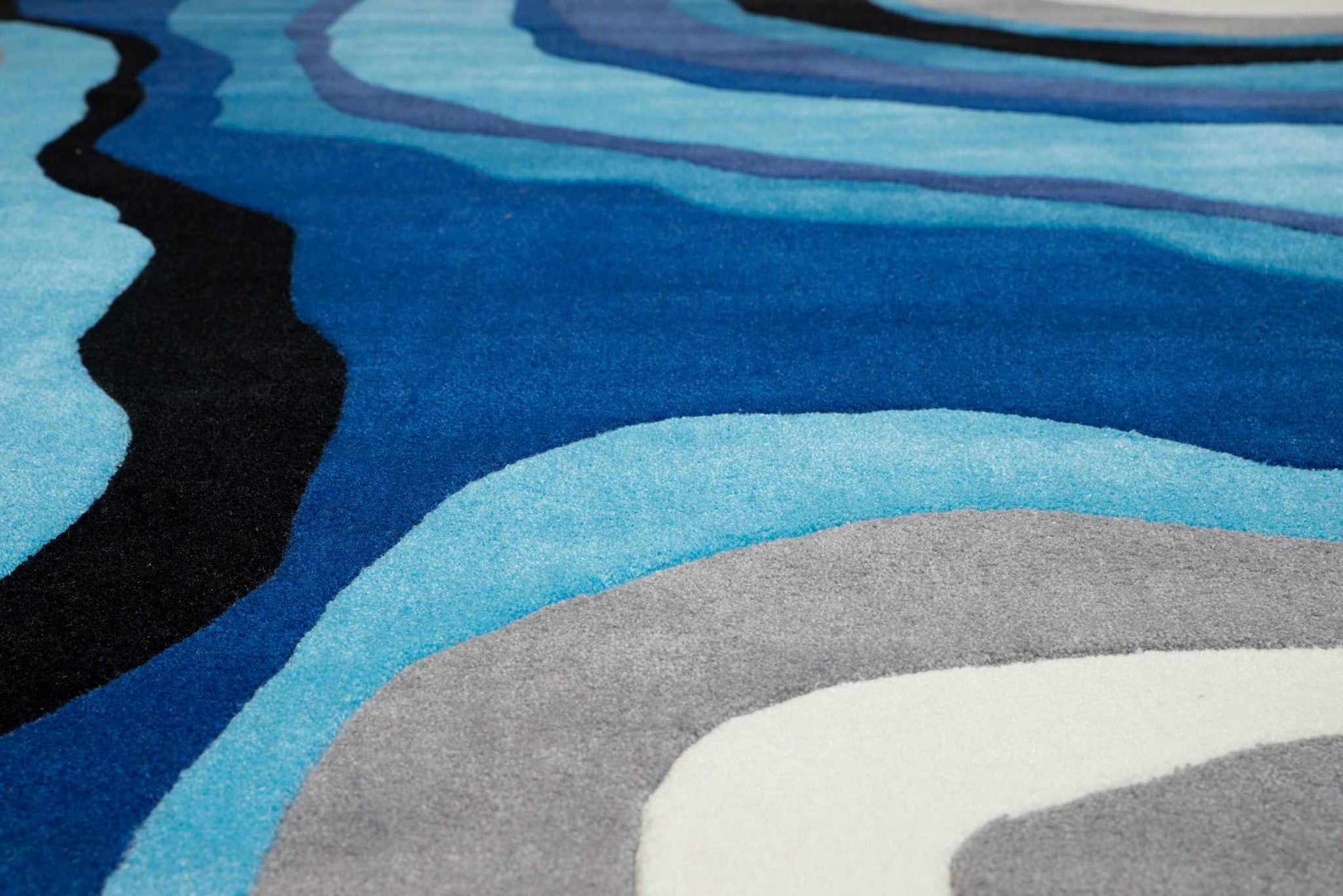 63" x 86" Blue Polyester Area Rug