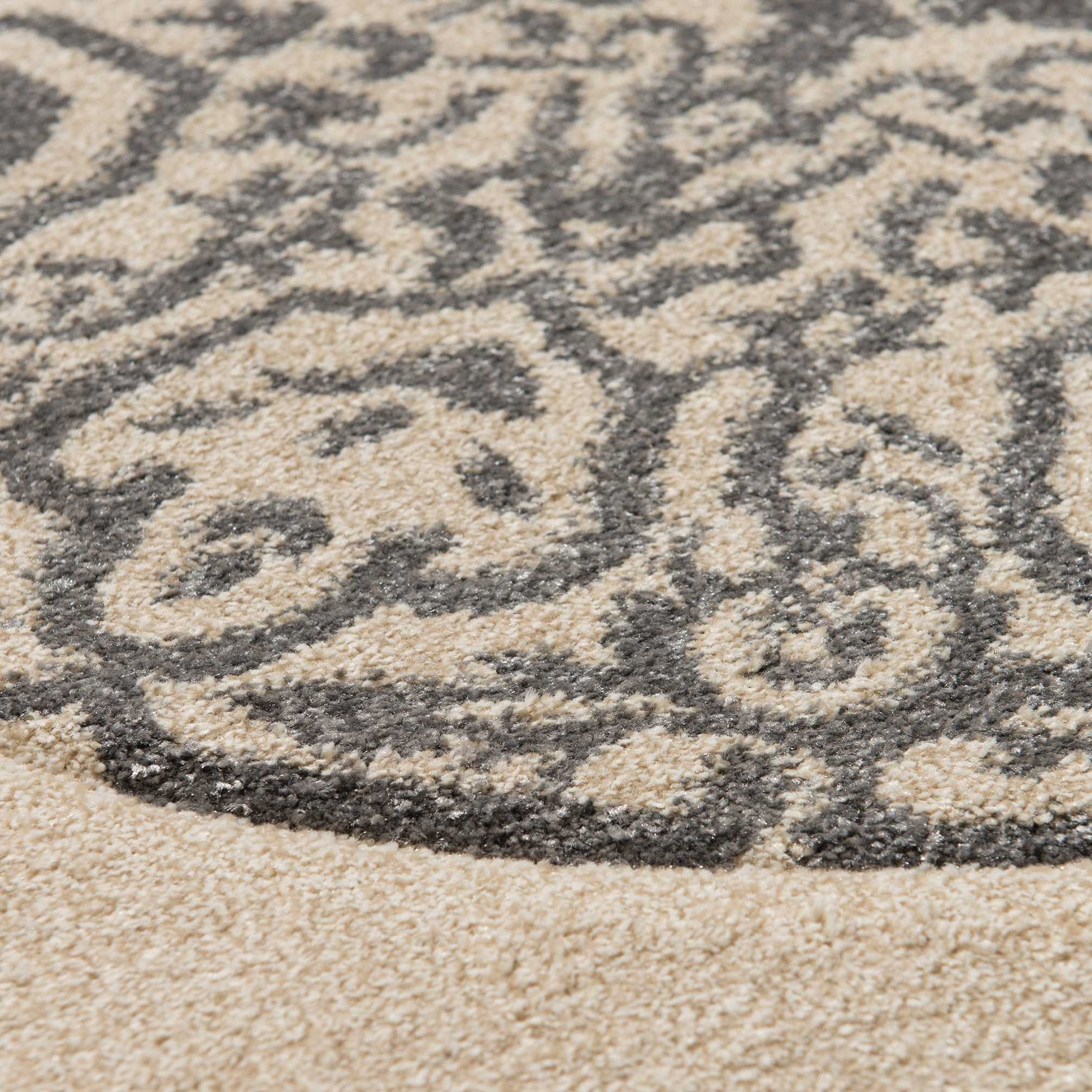 61" x 90" Cream Polypropylene Area Rug