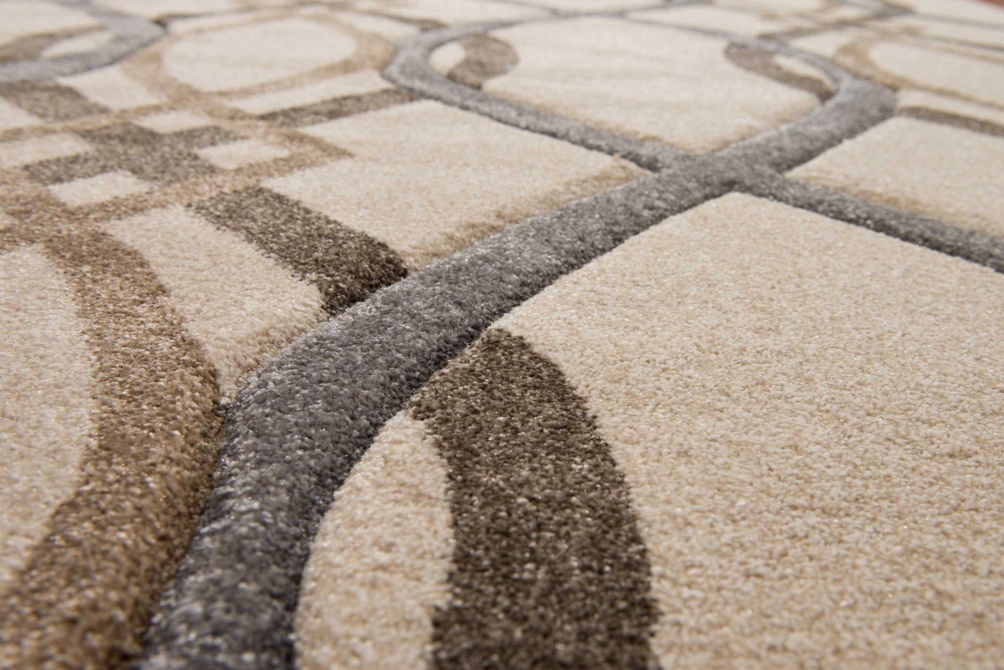 61" x 90" Cream Polypropylene Area Rug