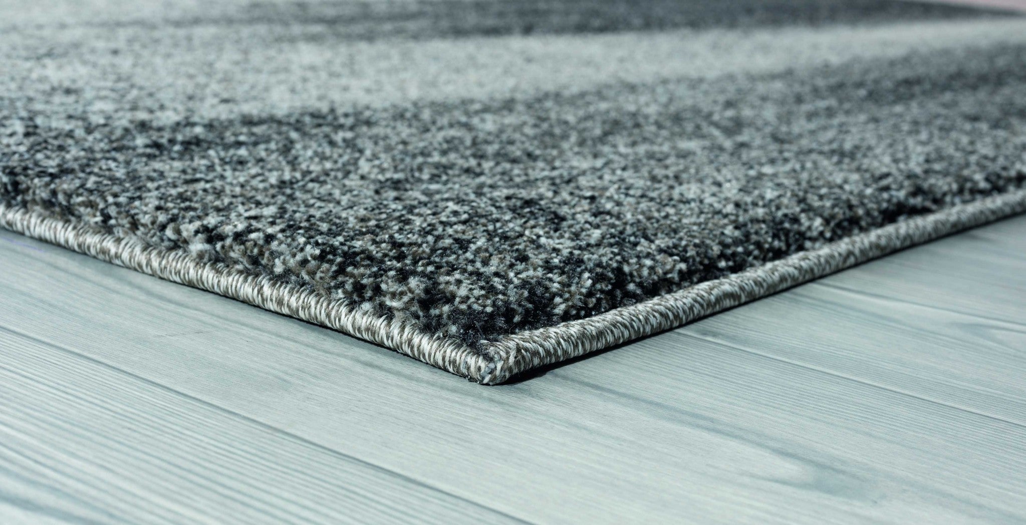 63" x 86" Grey Polypropylene Area Rug