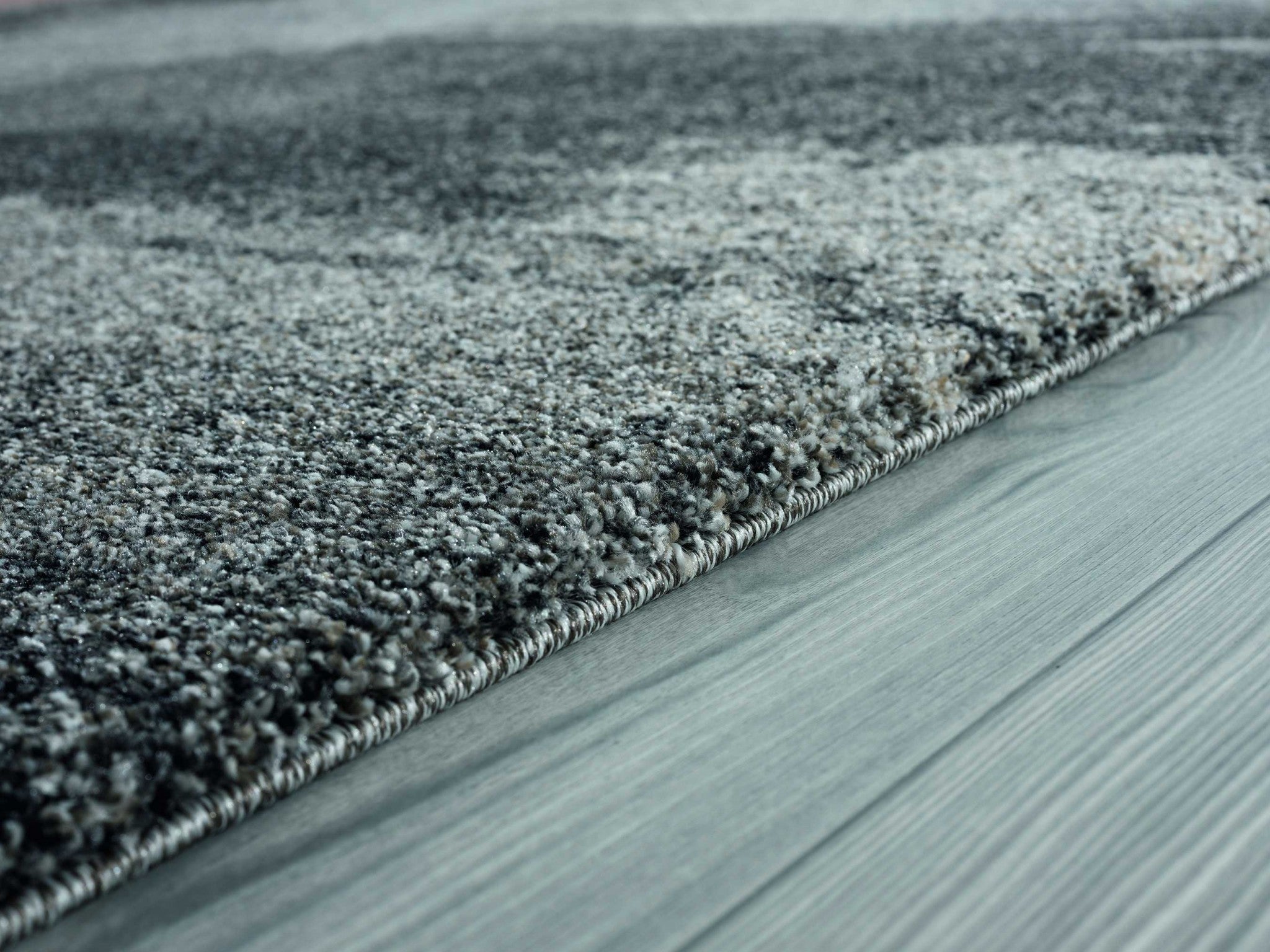 63" x 86" Grey Polypropylene Area Rug