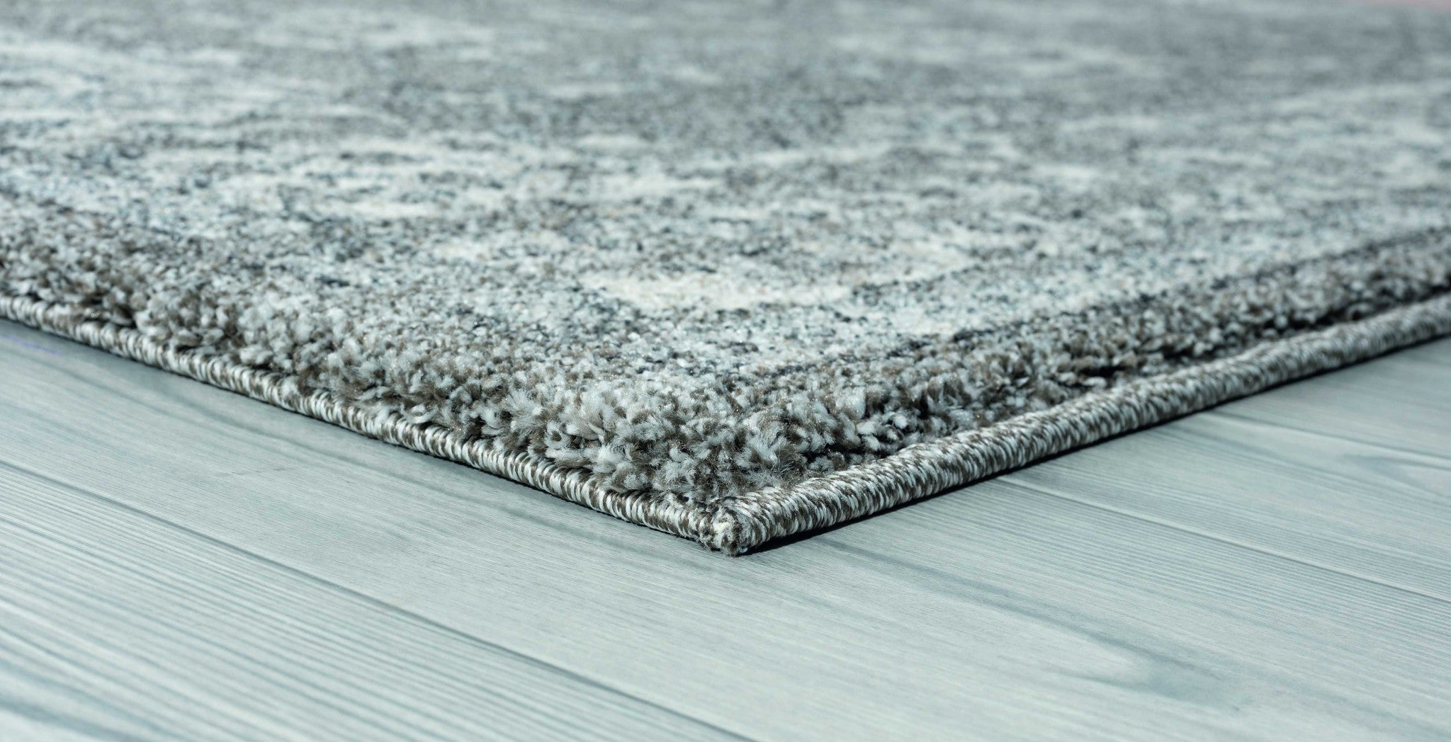 63" x 86" Grey Polypropylene Area Rug