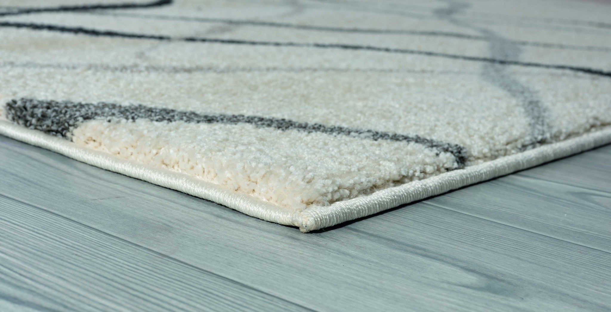 22" x 36" Cream Polypropylene Accent Rug