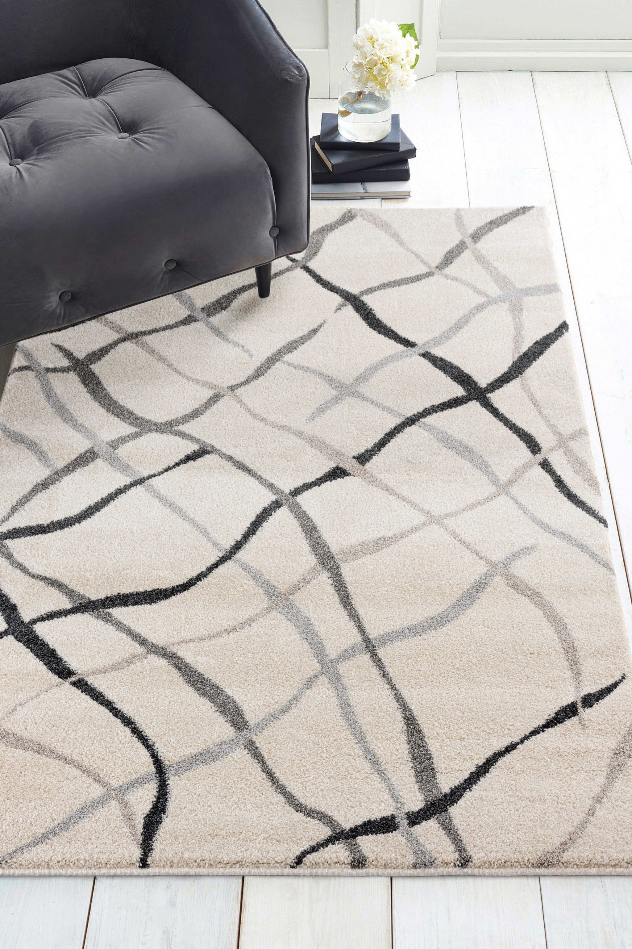 63" x 86" Cream Polypropylene Area Rug