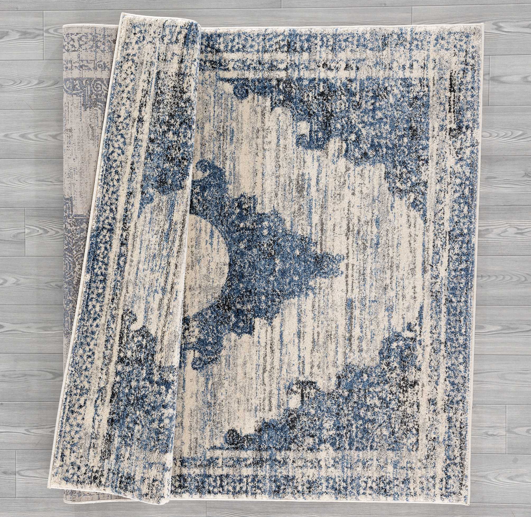 31" x 50" Cream Polypropylene Accent Rug