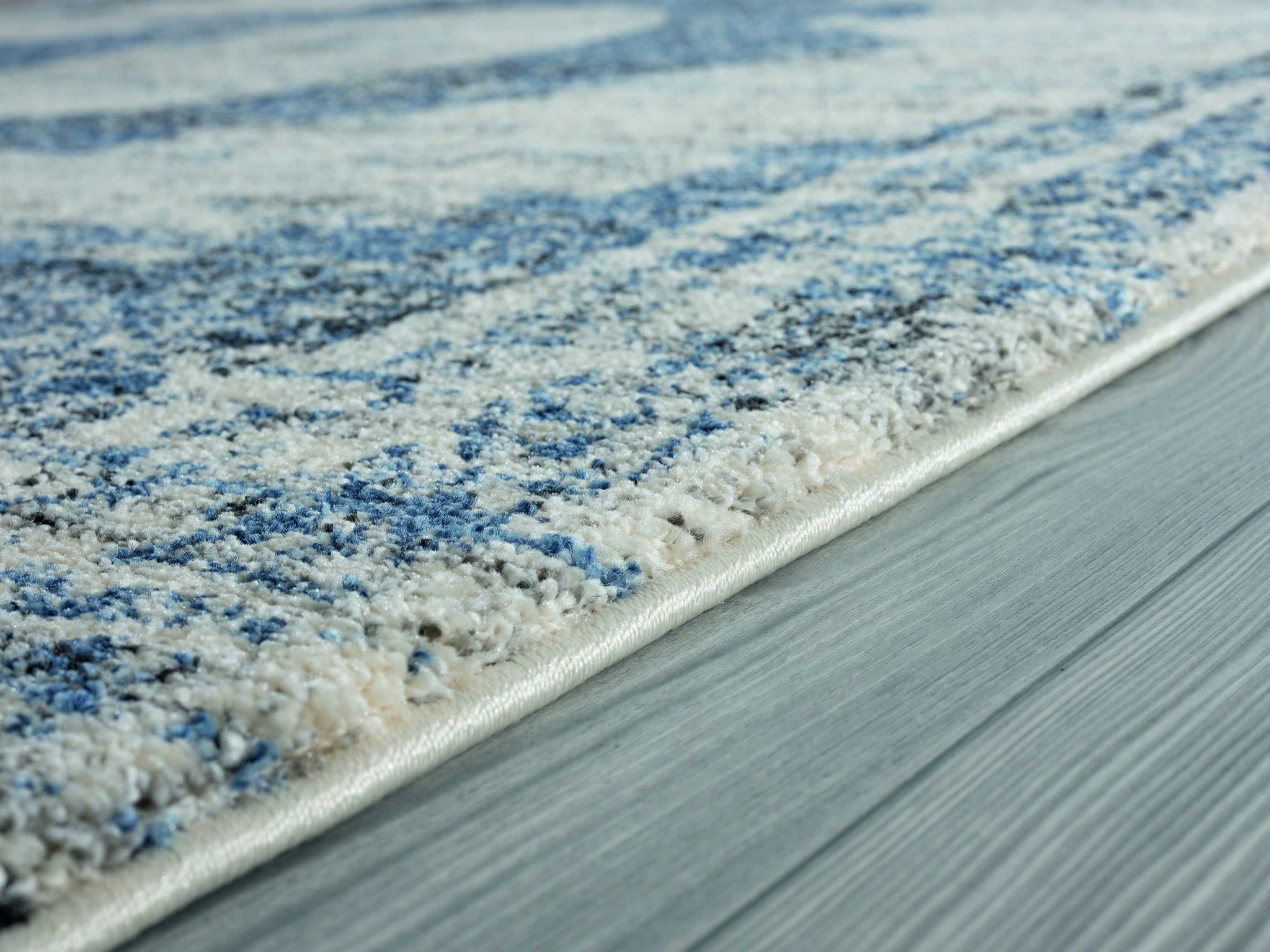 63" x 86" Cream Polypropylene Area Rug