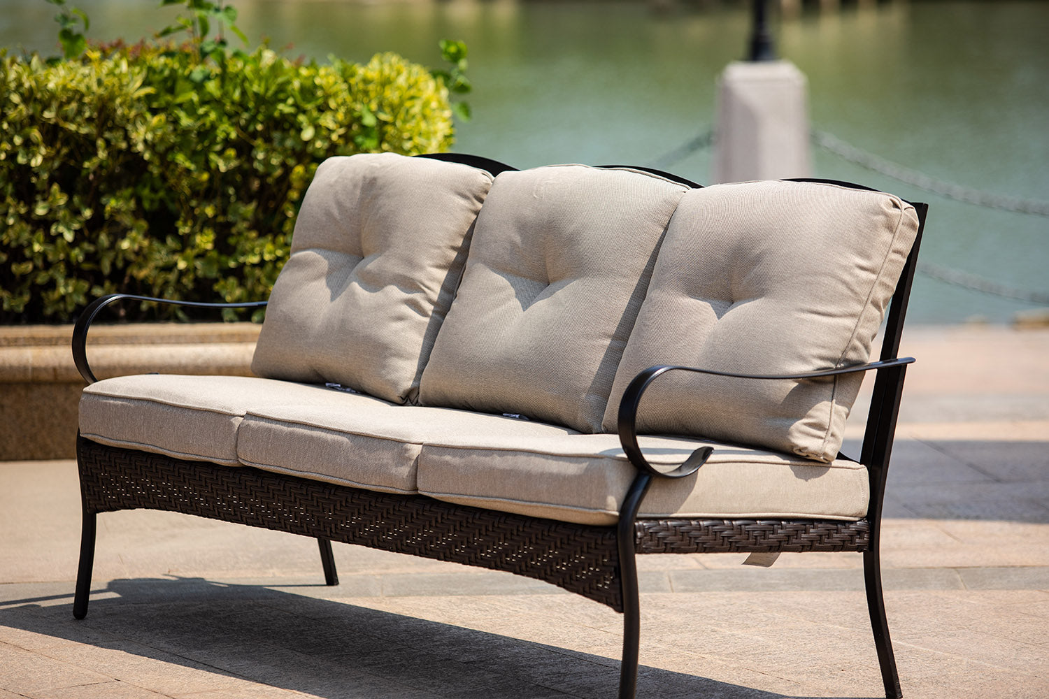 69" X 29" X 35" Black Steel Sofa with Beige Cushions