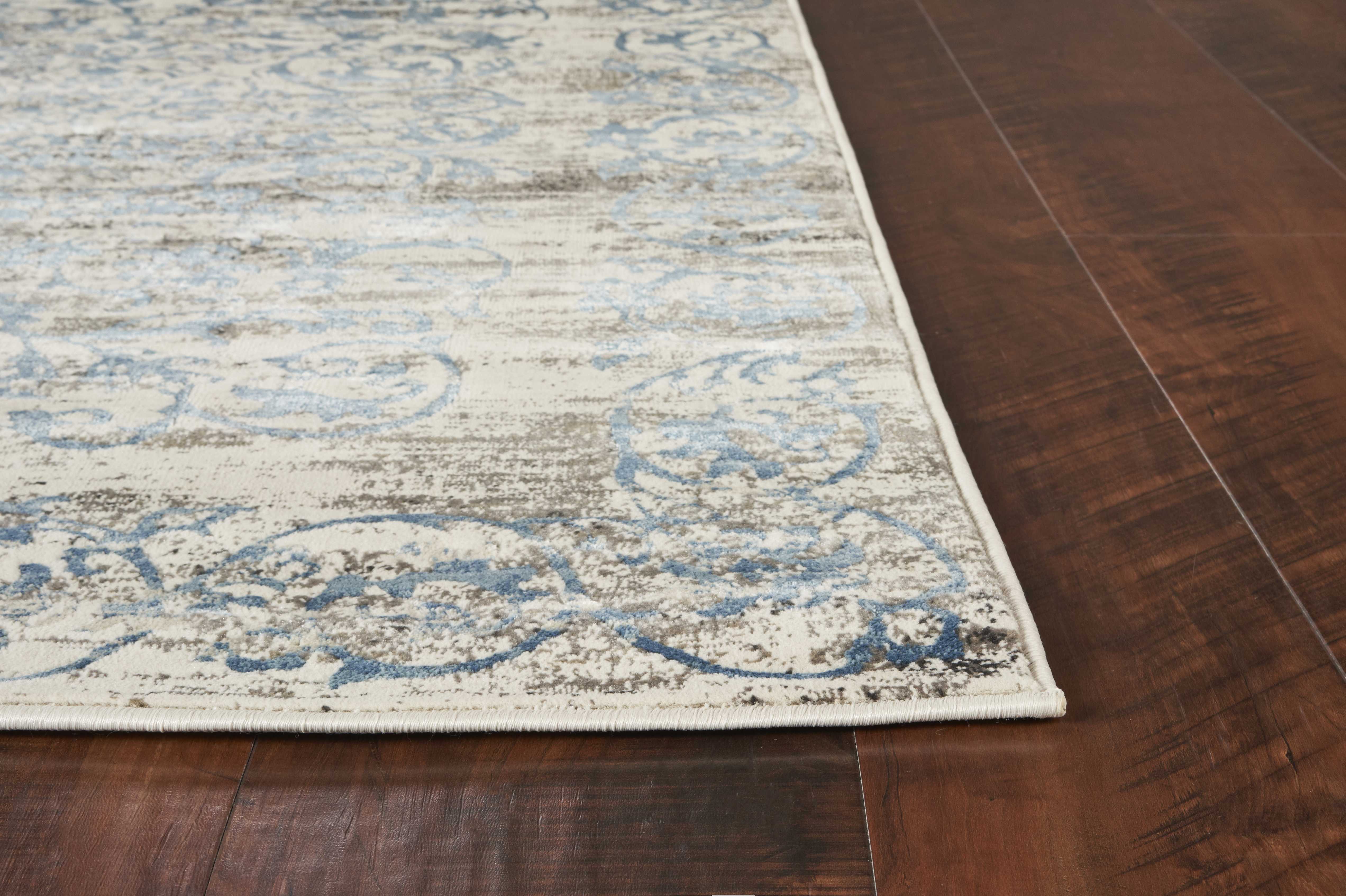 79" X 114" Ivory or Blue Polypropelene or Viscose Rug