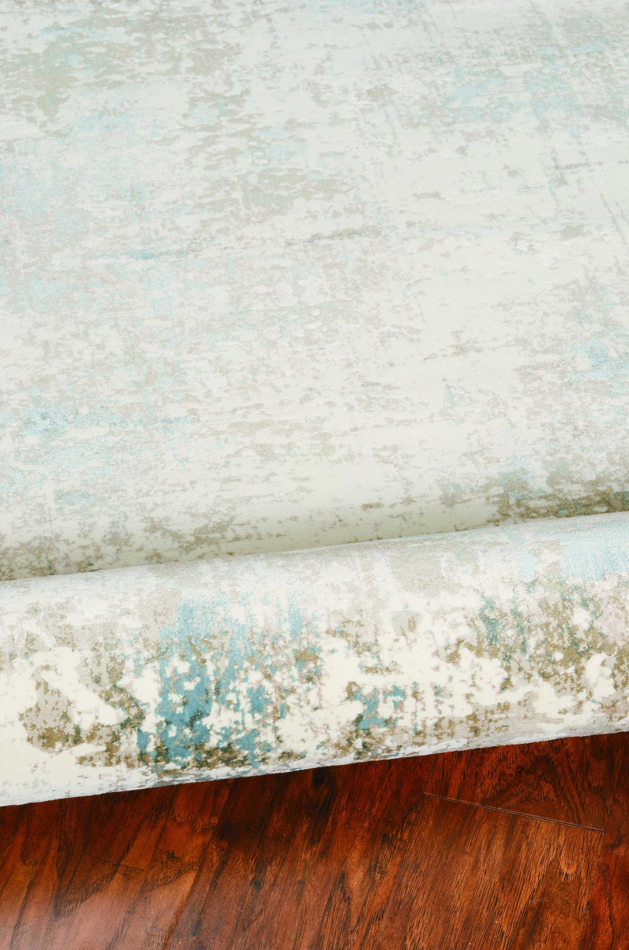 94" X 134" Ivory  Polypropelene or Viscose Rug