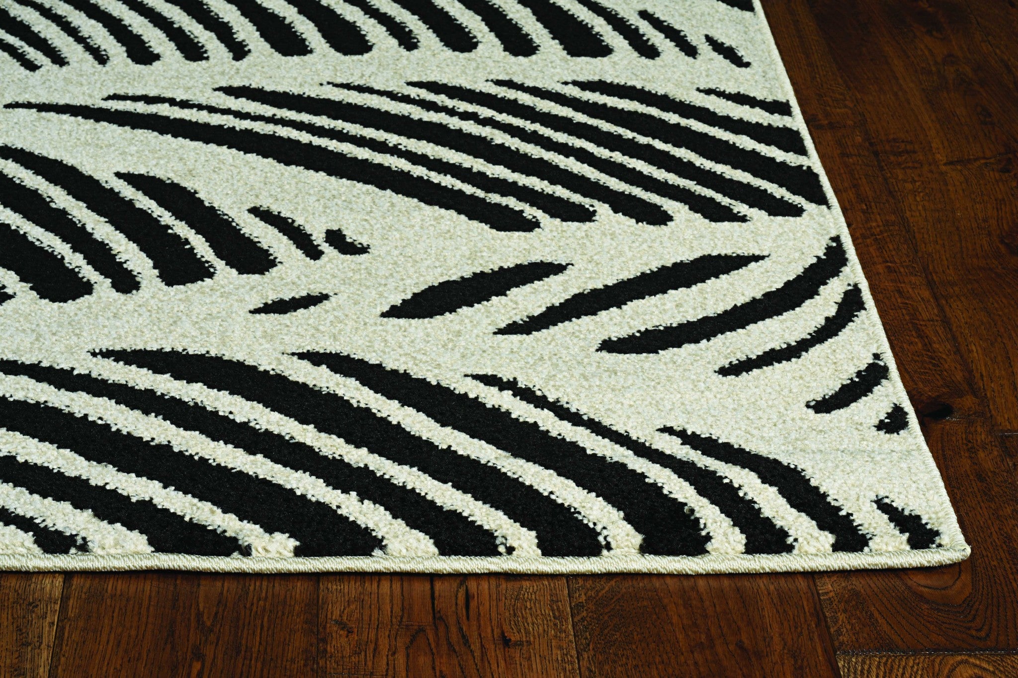 23" X 45" Black or  White Polypropelene Rug