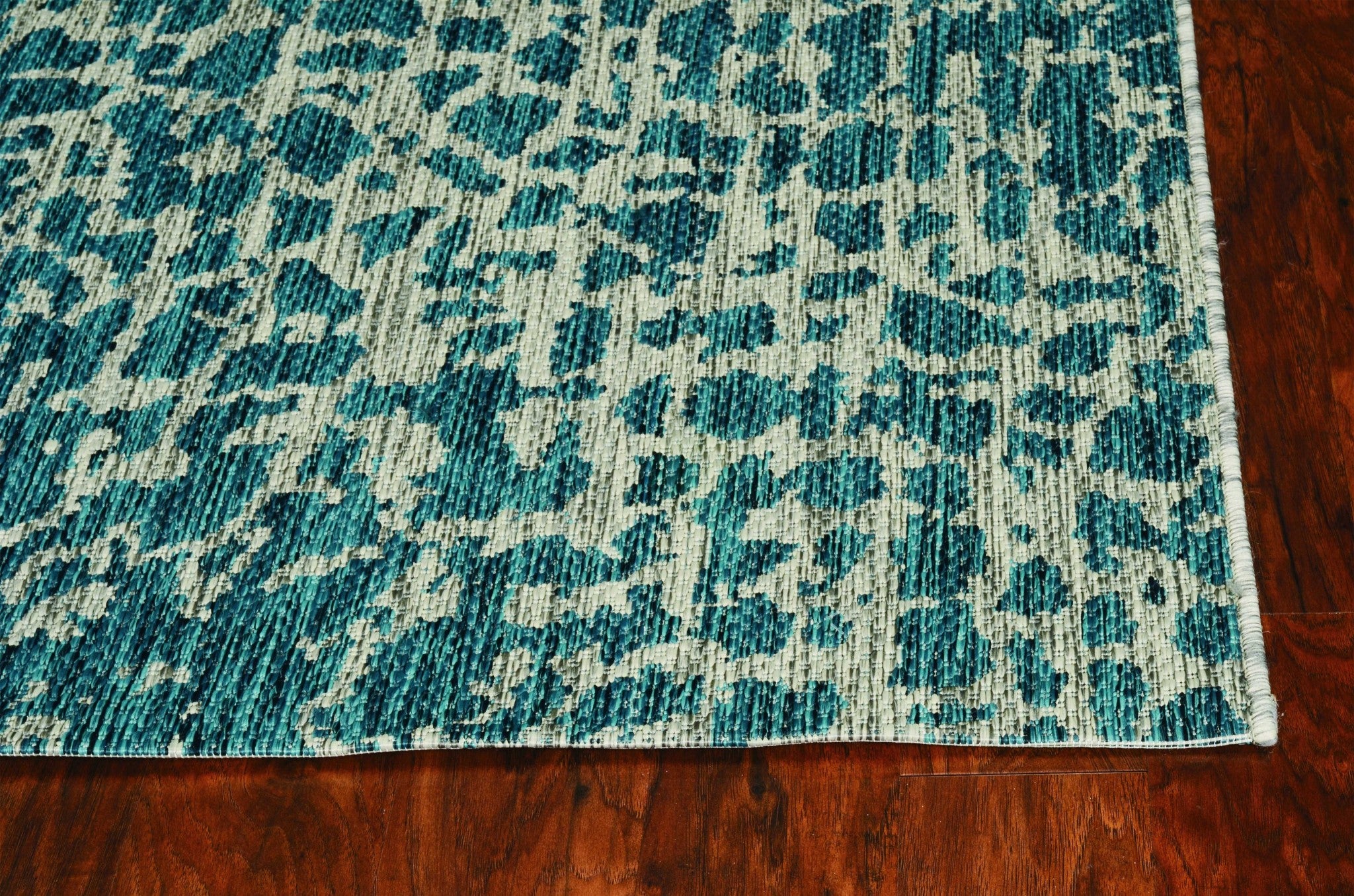 47" X 31" Teal Polypropylene Rug