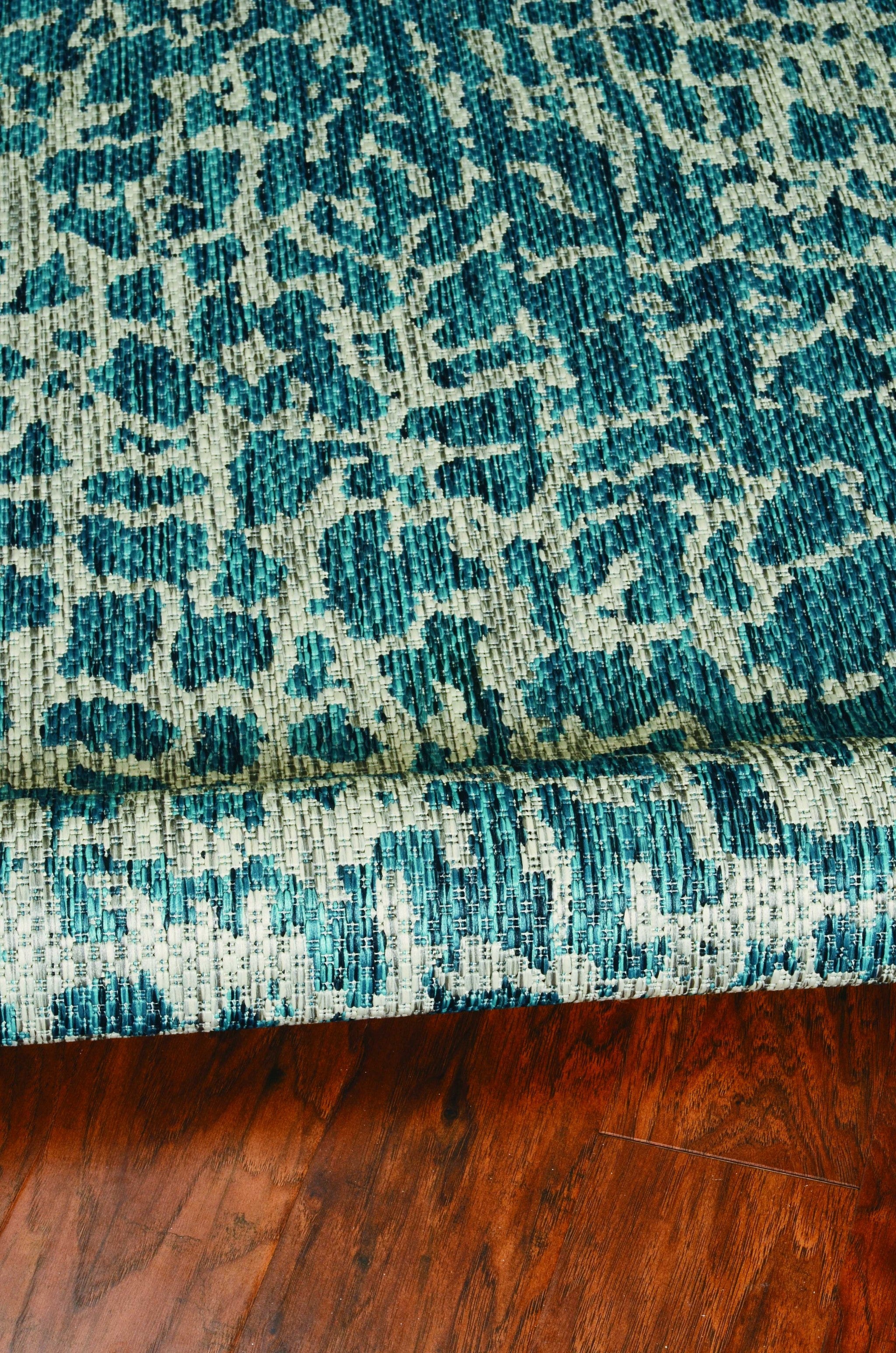 47" X 31" Teal Polypropylene Rug