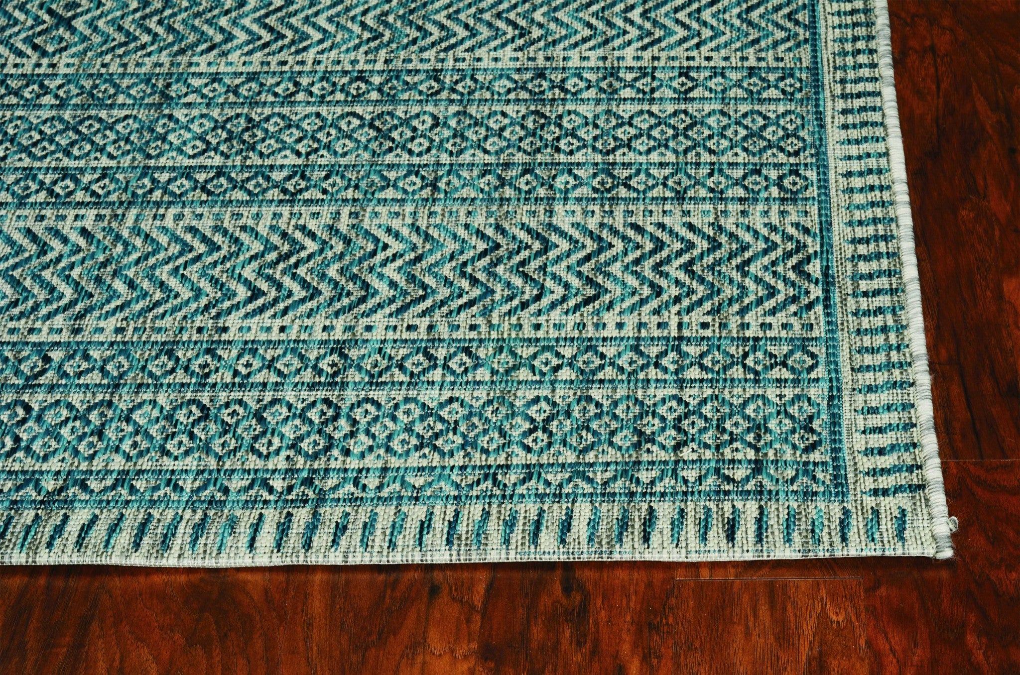 47" X 31" Teal Polypropylene Rug