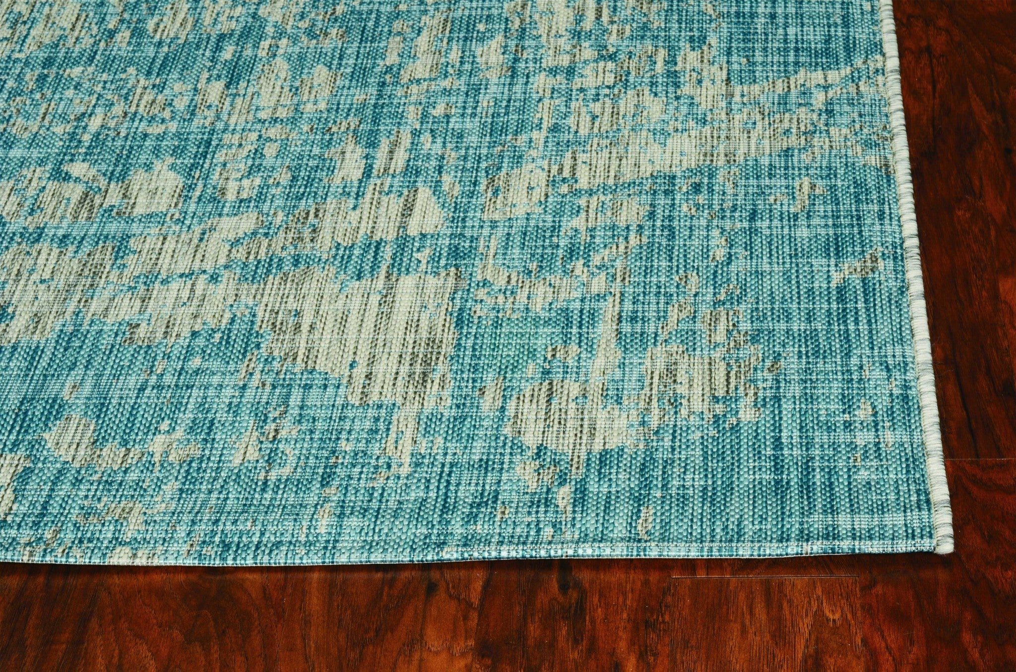 47" X 31" Teal Polypropylene Rug