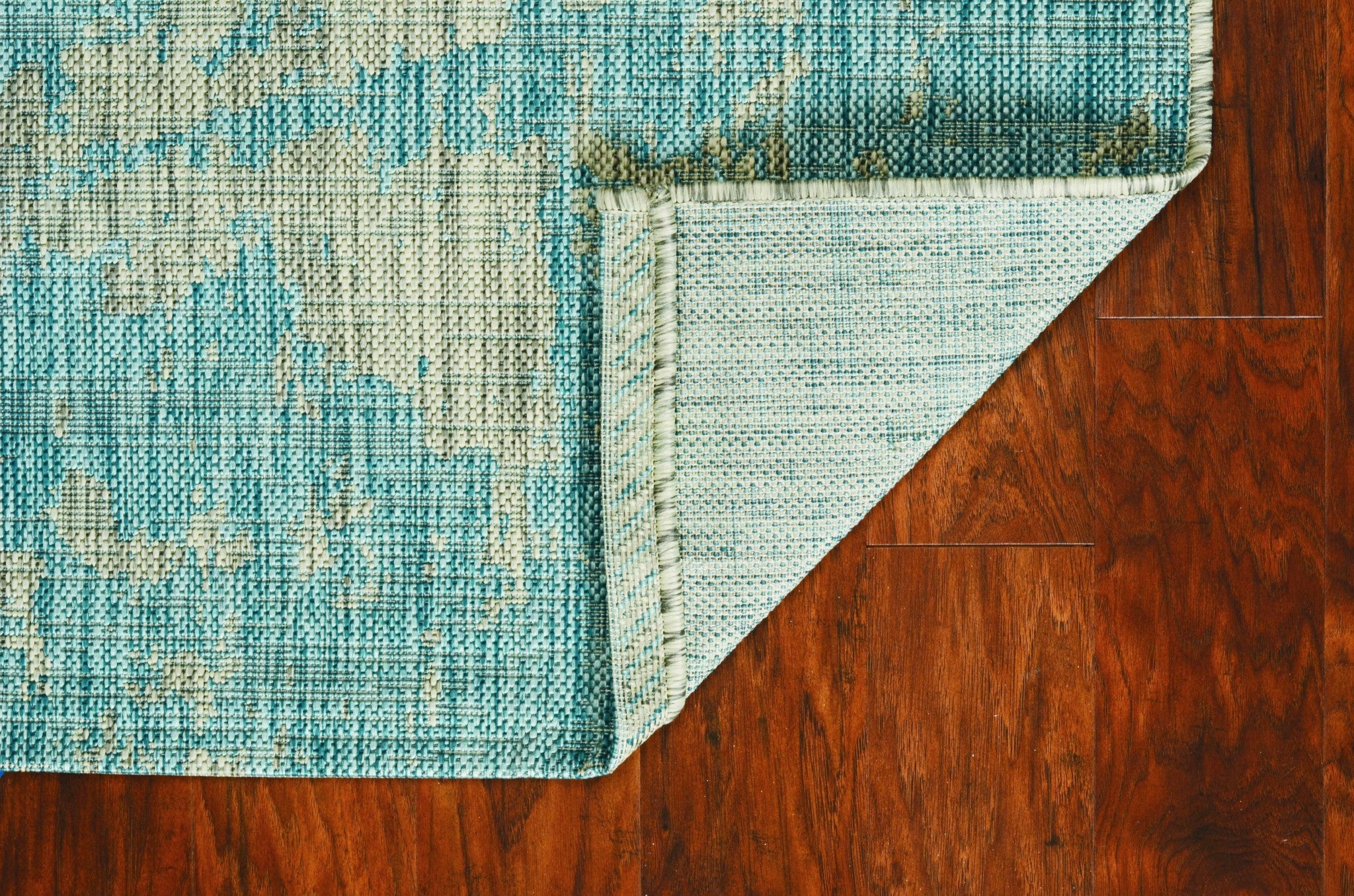 63" X 91" Teal Polypropylene Rug