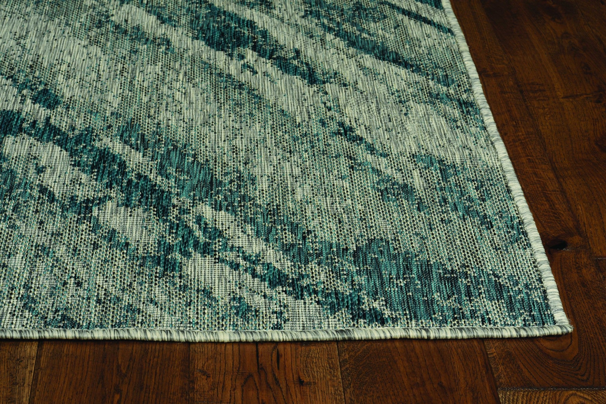 47" X 31" Grey or  Teal Polypropylene Rug