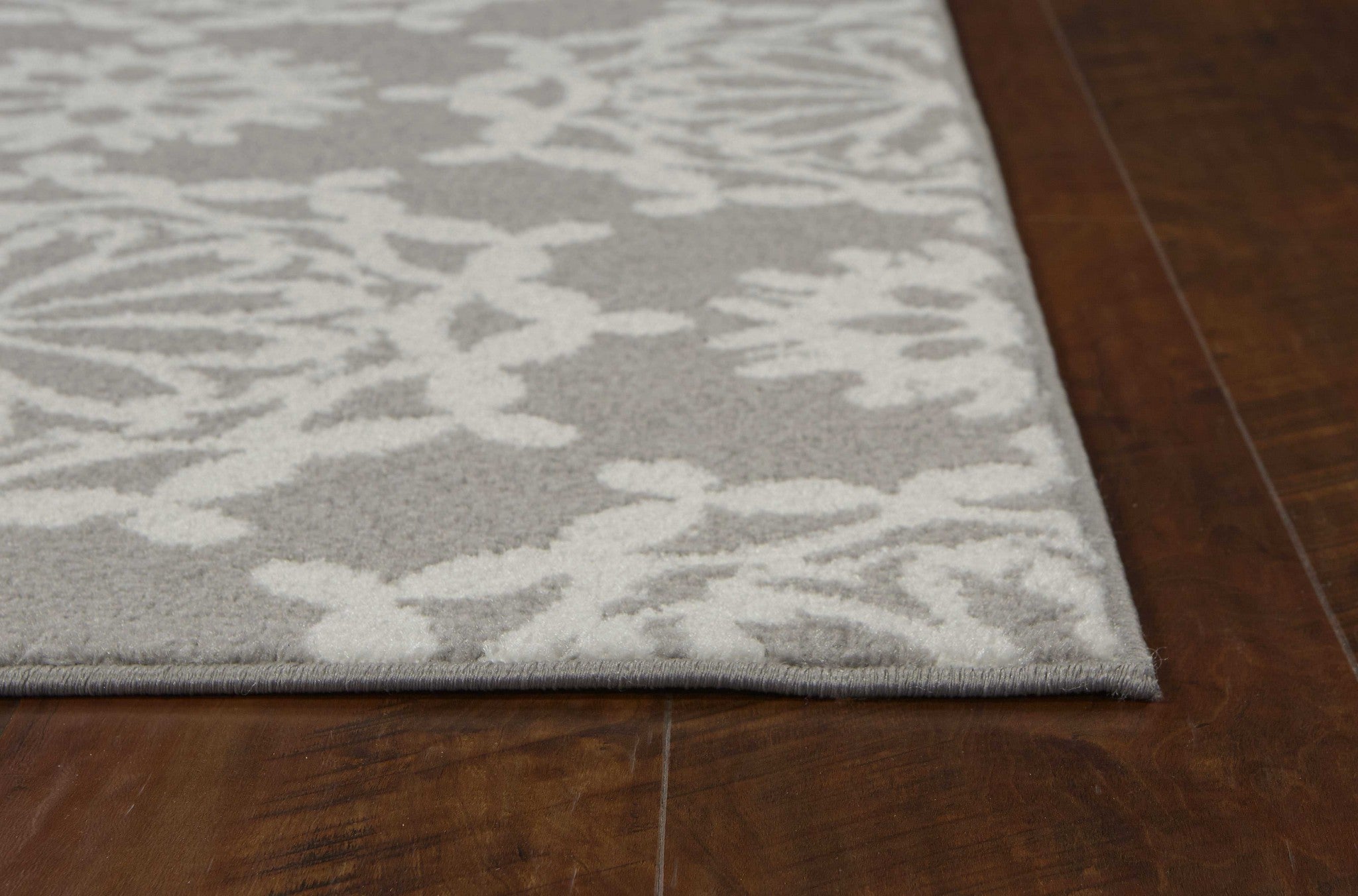 63" X 91" Grey or  Ivory  Polypropelene Rug