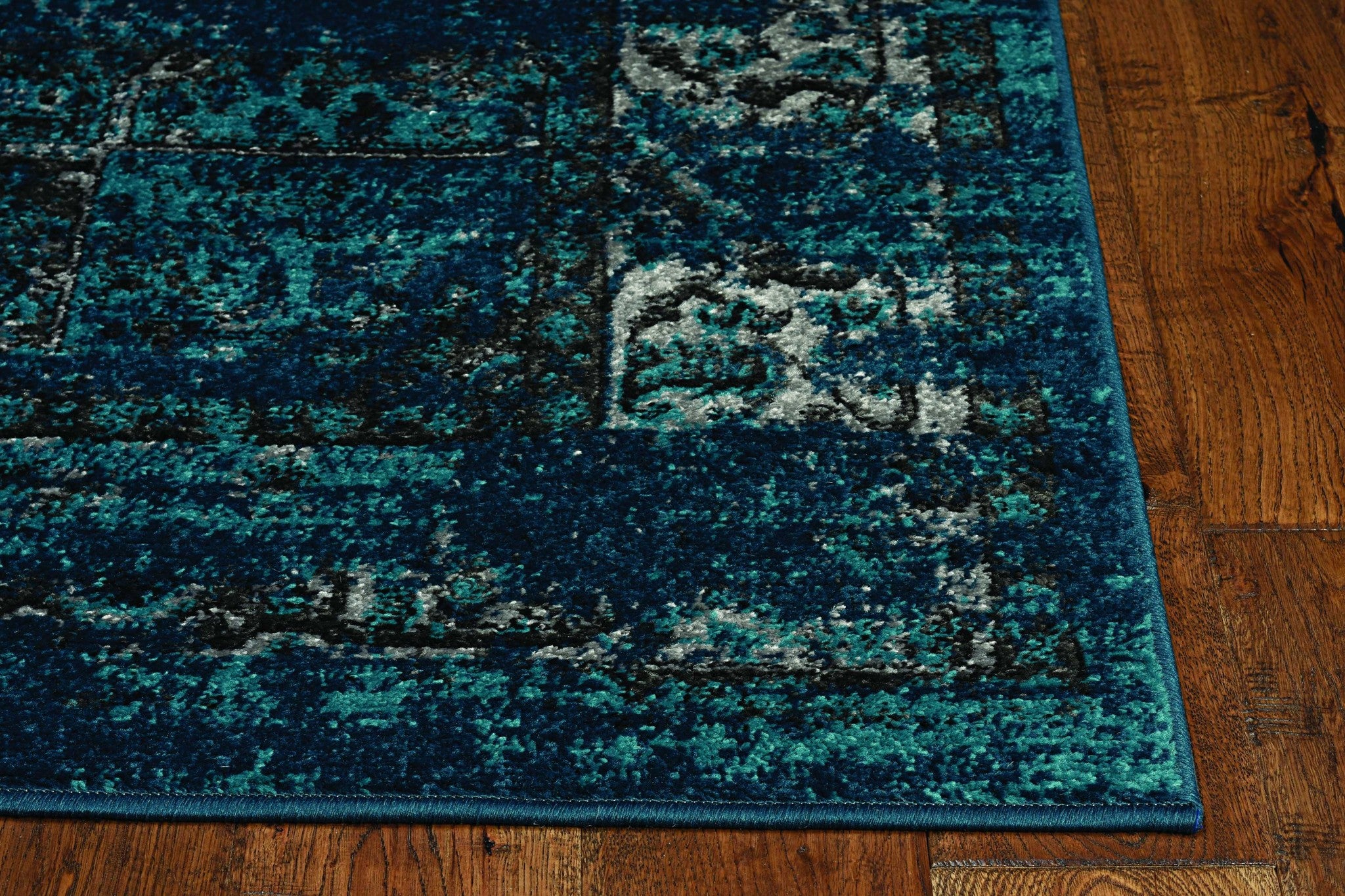 63" X 91" Teal Polypropelene Rug