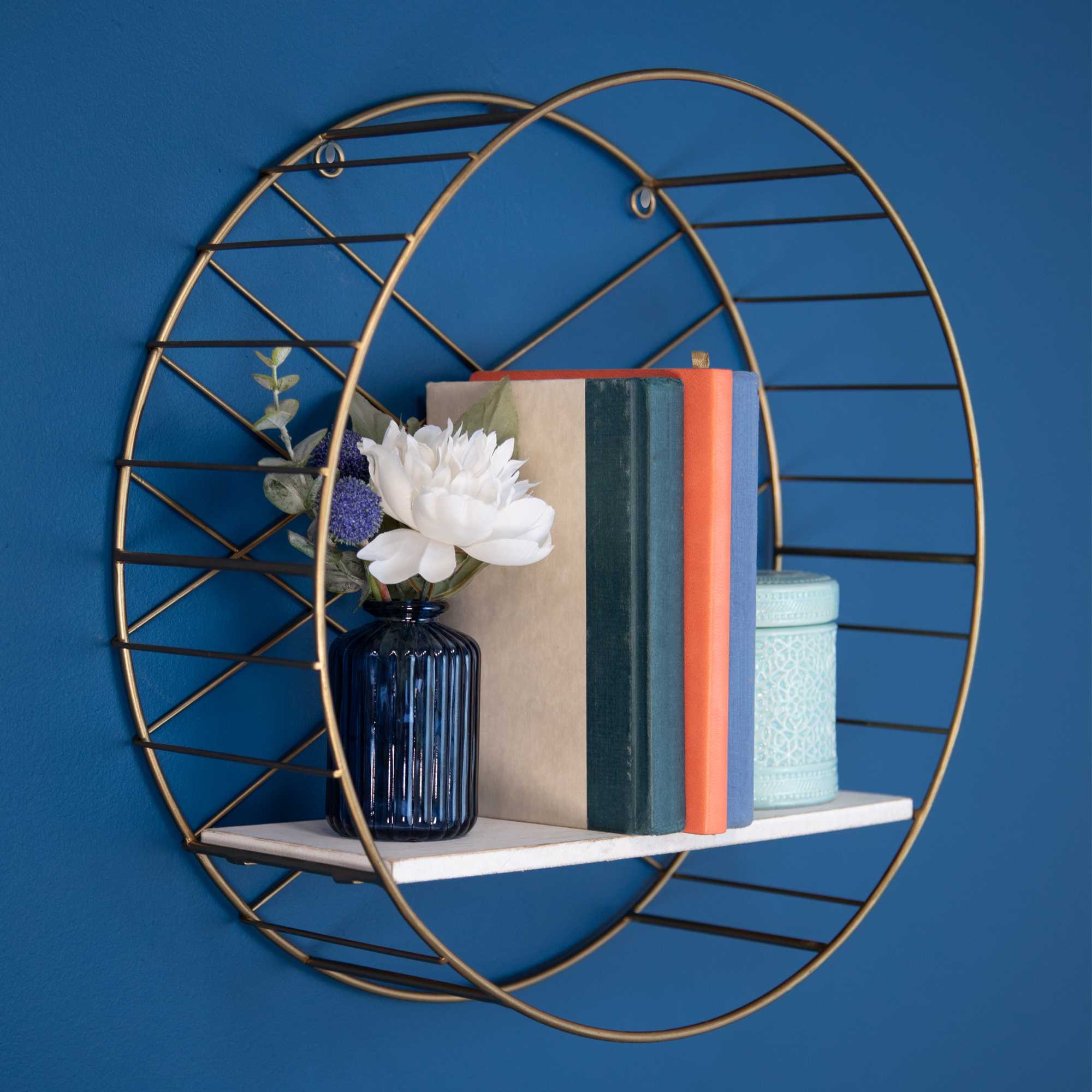 Round Wall Shelf Coated With a Matte Gold Finish