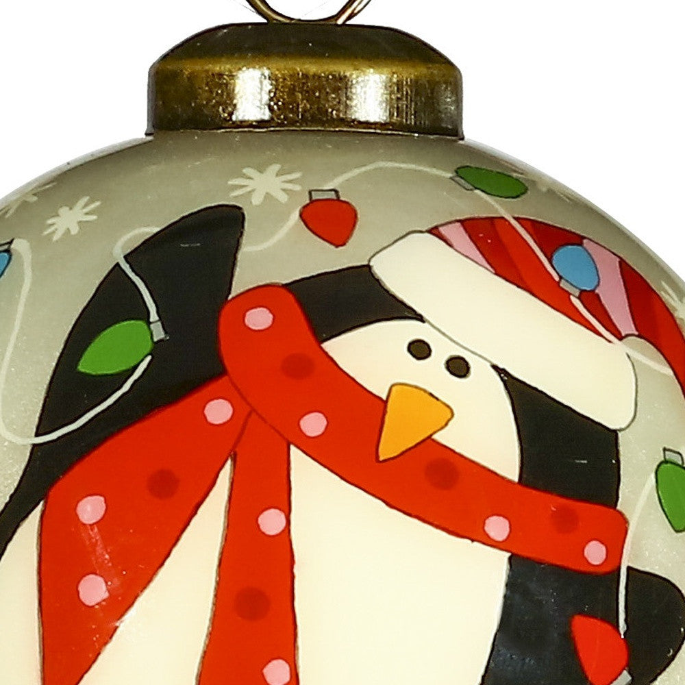 Festive Penguin Hand Painted Mouth Blown Glass Ornament